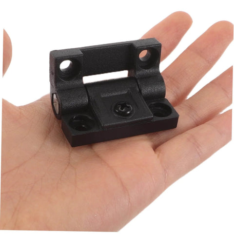 Adjustable Plastic Cabinet Hinges With Torque Friction Folding Support shown in hand, displaying black hinge, 90° stop.