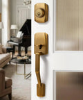 Antique Brass Front Door Handleset With Reversible Lever And Deadbolt Entry Door Hardware With Lock And Key Adjustable Latch for Doors 1 3 8 To 1 3 4 Inches Single Cylinder Built To Last, shown in living room setting.
