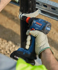 Person using Two In One Cordless Impact Driver And Wrench 18V Connected Ready For One Fourth Inch And One Half Inch Bits and Sockets outdoors