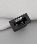 Pair Of Rock Solid Automotive Blade Fuse Holders For Surface Mount PCB And Flush Panel Install showcases a black fuse holder close-up.