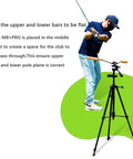 Golfer using Golf Swing Training Kit With Phone Holder Lightweight 360 Degree Alignment Sticks Tripod Stand for swing improvement.