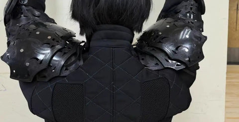 Back view of hardwearing plastic shoulder armor for medieval pauldron built for realistic steel sword sparring strong defense