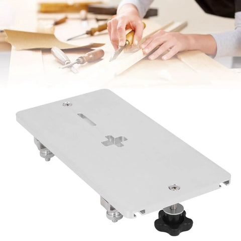 Close-up of Electric Jig Saw Flip Board with Aluminum Router Table Insert Plate for woodworking precision, stable workbench.