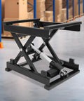 Sturdy Electric Scissor Lift Table With Remote And Manual Control Holds 130 Lbs For Easy Material Handling In Garage And Warehouse Plus Foldable Hydraulic Platform Adjusts Height From 7.17 To 16.14 Inches, black scissor lift with hydraulic mechanism.