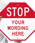 Tough As Nails Custom Stop Sign 18 X 18 Inches With Super Slick 3M Reflective Finish Hella Durable Rustproof Aluminum Metal For Outdoor Parking Lots Gates And Garages Usa Made held by a person.