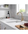 Modern Single Handle Bar Sink Faucet With Smooth Glide Lever And Slick Brushed Gold Finish for clean kitchen design and single hole setup.