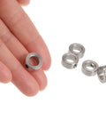 Set screw shaft collars, close-up view, 7.05 mm bore, 12 mm OD, 5 mm width, metal finish