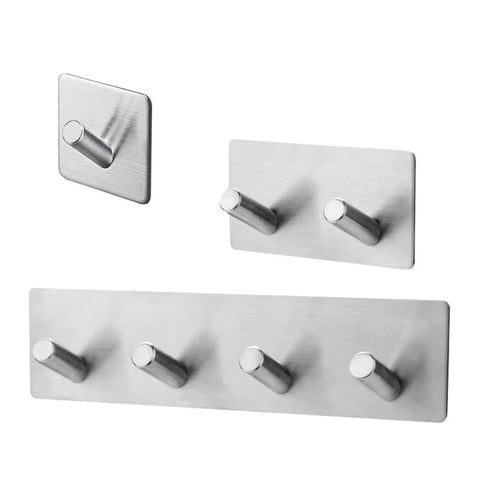 Heavy Duty Black Stainless Steel Wall Hooks Double Robe Hook Slick Space Saver For Bathroom Closet And Foyer Holds Jackets Purses Towels Built Tough To Keep Your Setup Organized, showing multiple hooks on a wall.