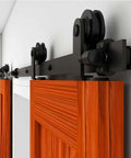 Side view of 8Ft Sliding Barn Door Hardware Kit For 24 Inch Wide Double Doors Top Mount Roller Matte Black Finish installed on wood door