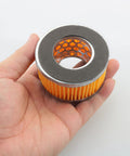 Person holding air filter from Two Pack Replacement Air Filter Elements For Air Compressors Intake Paper Filters Type 1