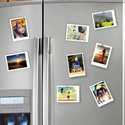 Beefy 12 Lb Pull Neodymium Disc Magnets With Countersunk Hole 1.425 By 0.3 Inches holding photos on fridge