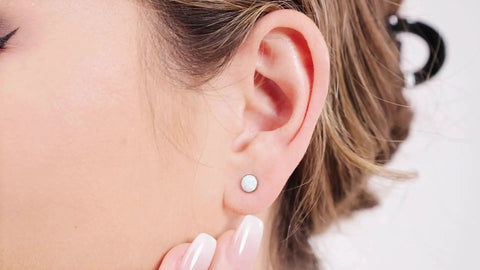 Solid Implant Grade Titanium Screw Back Earrings Made For Sensitive Skin With Hypoallergenic F136 Studs, worn in ear with white opal detail.