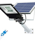 Hella Bright Solar Led Flood Light With Remote Control For Outdoor Yard And Garden Ip65 Waterproof Dusk To Dawn Sensor 300 Watt mounted on pole with solar panel.