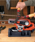 Heavy Duty Belt Sander With Dust Bag 7 Amp Motor 3 Inch By 21 Inch Angled Sanding Belt for edge sanding, shown in use on workbench.