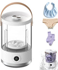 Compact Portable Mini Washing Machine For Dorm Life And Getaways Cordless Electric Washer with socks, underwear, and a bib.