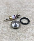 Close-up of water jet on/off valve repair kit parts: valve stem, brass collar, conical tip, aluminum plug, O-ring.