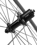 Close-up of Shimano hub on Pro Grade Carbon Fiber Road Bike Wheels 50mm Clincher Wheelset 700C Racing Aero Beasts.