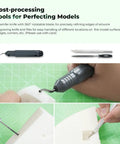 3D printer tool kit with gray rotary tool, knives, spatulas, and files for finishing prints