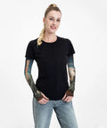 Gonna Need These Badass Arm Sleeves Featuring Heavy Duty Sun Block And Thorn Proof Shielding Hella Comfy Fingerless Design worn by a woman.
