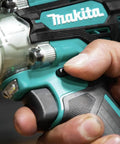Close-up of hand adjusting speed on 18V LXT Brushless Cordless Three Eighths Inch Drive Impact Wrench With Friction Ring Anvil