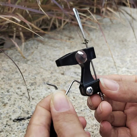 Two Pack Downrigger Release Clips With Ball Bearing Swivel For Outriggers And Kite Rigs, Smooth Line Release Arm, Precise Tension Adjuster, Durable Silver Finish, Great For Offshore Trolling Gear, black metal clip held in hand