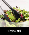 Heavy Duty Stainless Steel Kitchen Tongs Set Of 2 With Heat Resistant Silicone Tips tossing salad in a bowl