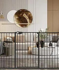 Extra Tall Wide Pressure Mounted Baby Gate With Triple Lock Walk Through Swing Auto Close Safety Black Metal in a modern living room
