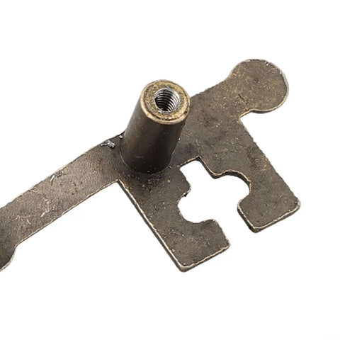 Close-up of a key shape cabinet pull handle in zinc alloy with bronze finish, threaded screw hole visible, 13.4 x 5.4 cm
