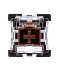 Close-up of a single 3-pin tactile brown switch for mechanical gaming keyboards, part of a 32 pack compatible with MX standard keyboards.