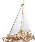 Hands On Trimaran Merihobus Wooden Sailboat Model Kit For Grown Ups 3D Puzzle With Self Assembly No Glue shows assembled wooden trimaran