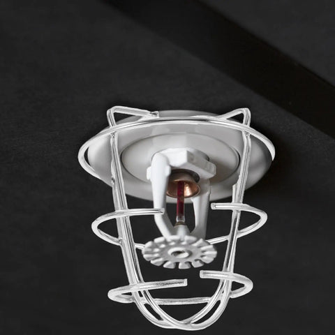 Set Of Four Stainless Steel Fire Sprinkler Cage Guards For Half Inch Heads Heavy Duty Anti Collision Shields Rock Solid Construction No Mess Setup Keeps Your Building Code Essentials Running Tight - close-up view of a sprinkler head guard.