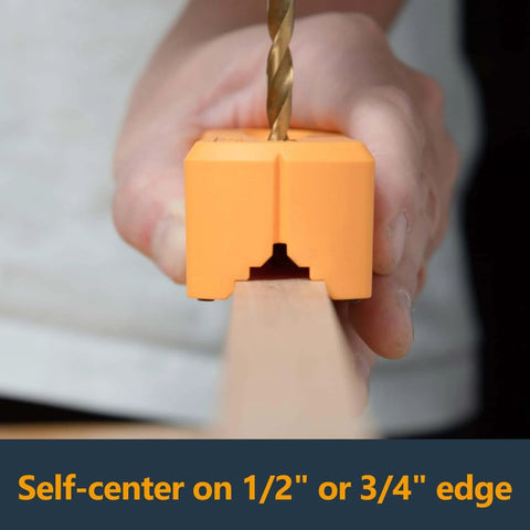 Close-up of Pro Grade Drill Guide And Jig Block with a drill bit inserted, showing self-centering on edge for accurate drilling.