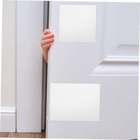 Self Adhesive PVC Siding Patch Kit with 10 Sheets applied on a door, showing white vinyl patches used for repair