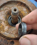 Mechanical Shaft Seal Replacement 104-17 For Pump Shaft Water Pump Sealing Kit alloy plastic dual pack, hand held near rusted pump shaft