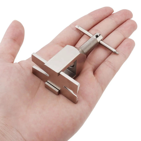 Heavy Duty Rc Motor Pinion Gear Puller And Remover Kit For Small Truggy Models And Helicopters in a hand, showcasing steel construction.
