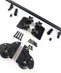 Top Shelf Sliding Barn Door Hardware Kit With Adjustable Library Ladder Track Rail And Beefy Floor Casters For A Smooth Ride Across Every Room In Your House Black hardware components including wheels and wall mounts.