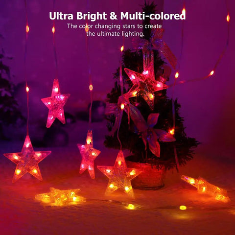 Star Curtain Lights 10ft By 3.3ft RGB LED Color Changing String Fairy Lights With 130 LEDs And 10 Stars, Smart App And IR Remote, 200 Plus Scene Modes For Bedroom Backdrop, Indoor Outdoor Christmas Decor And Party Vibe, showing glowing multi-colored stars on a dark background.