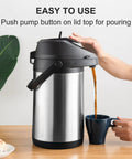 Large Capacity Thermal Airpot Coffee Carafe 101 Oz with Lever Action Pump and 3 Cups in use, pouring coffee into a mug.