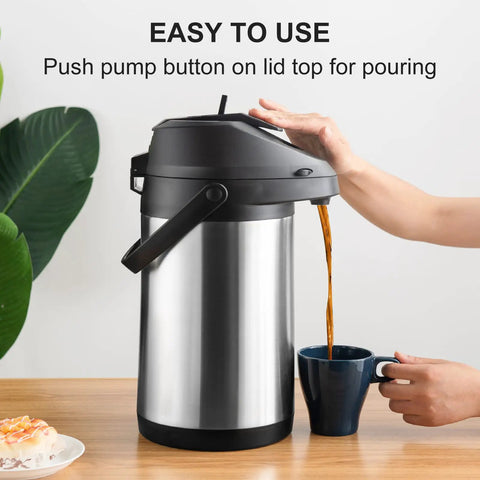 Large Capacity Thermal Airpot Coffee Carafe 101 Oz with Lever Action Pump and 3 Cups in use, pouring coffee into a mug.