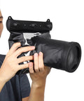Man holding Underwater DSLR Housing for Deep Sea Capture Gear, 20 Meter Depth Rating Waterproof Case with camera inside.