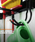 Heavy Duty Wall Tool Storage Rack With Shelf and Adjustable Hanger System for Garage Organization, showing rubber-coated hooks