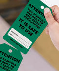 OSHA Compliant Scaffolding Tags By The Roll, Attention Sign To Keep Scaffolds Safe And On Point, held in hand