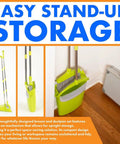 Kickass Heavy Duty Broom And Dustpan Combo Set With Long Commercial Handle For Lobby Kitchen Floor Sweep Up Solid Upright Grip Brush For Quick Interior Clean Up In Green stored upright in a corner.