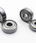 Get A Buttery Smooth Ride With These Heavy Duty Wheelchair Rear Bearings 4 Pack Universal 11mm, showing two sets of bearings.