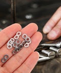 Sturdy Flat Connector Bracket Set In Silver Stainless Steel 8 Shape Quick Fasteners For Furniture, Jewelry Making, And DIY Repairs Versatile Office And Home Hardware, Easy Install, Strong Hold, close-up in hand