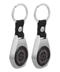 Mini Zinc Alloy Compass Keychain Set For Outdoor Adventures, showing two keychains with black straps and silver compasses
