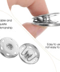 Close-up of silver snap buttons from 20 Sets Of 21mm Snap Buttons For Fabric And Clothes Metal Sew On Snaps Heavy Duty Snap Fasteners.
