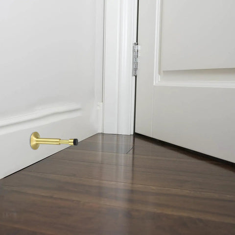 Gold wall-mounted hydraulic door stopper for bathroom and apartment doors, adjustable 28mm aluminum alloy build, noise reduction.