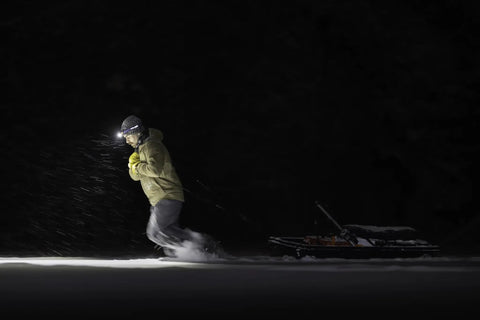 Person skiing at night with Double Power Rechargeable CREE LED Headlamp With 1800 Lumens, USB C Charging