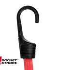 Close-up of a durable hook on a red bungee cord from the Ultimate Flat Outdoor Bungee Cord Set, used for securing cargo and gear.